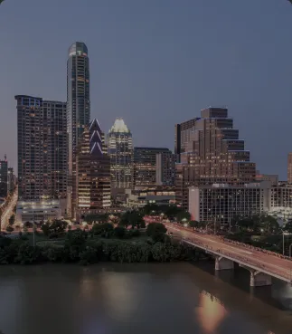 Austin, Texas skyline over Lady Bird Lake at dusk